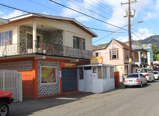 Triple S Super Market, left, located along the main Leeward Highway in Layou. (IWN photo)