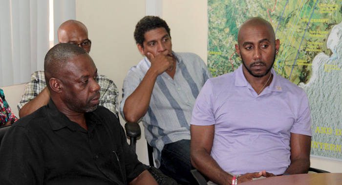 Head of the SVG Tourism Authority, Glen Beache, right, along with CEO and chair of the IADC, Dr. Rudy Matthias, left, at Friday's press conference. (IWN photo)