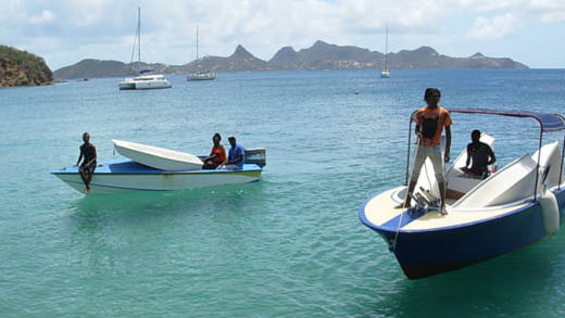 Boats owned by Grenadines Dive and Samuel Forde ferried the 5 Optis to Mayreau.