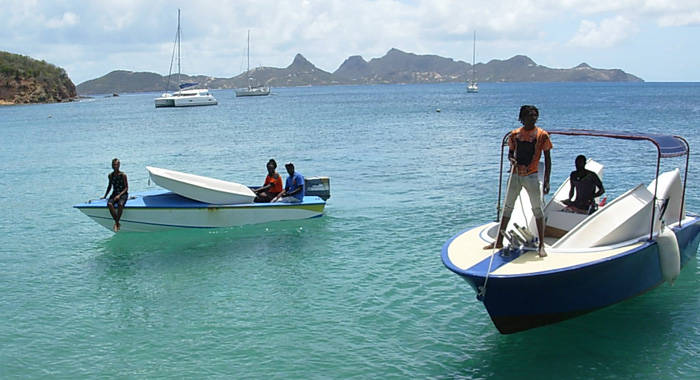 Boats owned by Grenadines Dive and Samuel Forde ferried the 5 Optis to Mayreau.