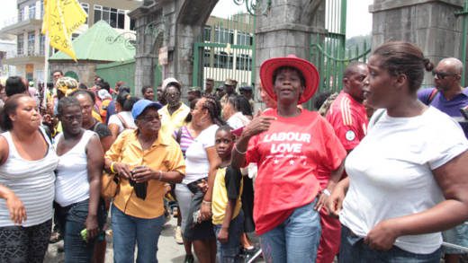 ULP and NDP supporters outside the court precinct on Monday. (IWN photo)