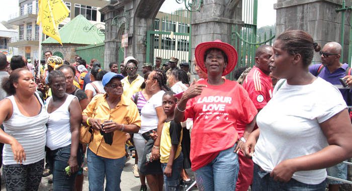 ULP and NDP supporters outside the court precinct on Monday. (IWN photo)