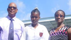 Co-ordinator of the Secondary School Bible Quiz, Joel Jack, winner Odelia Delpesche, and Clare Keizer, editor of Searchlight. 