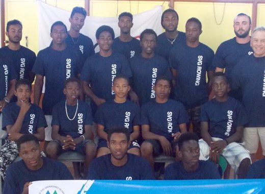 Athletes from the training camp, including Raffique Browne, Technical Director (left) and FISA Development Consultant Osvaldo Borchi (right).