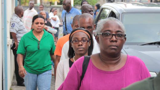Althia Morgan, her daughter, Krystal, husband, Nigel, and police officer arrive at the Serious Offences Court in Kingstown in April 2016, when they were arraigned. (iWN file photo)
