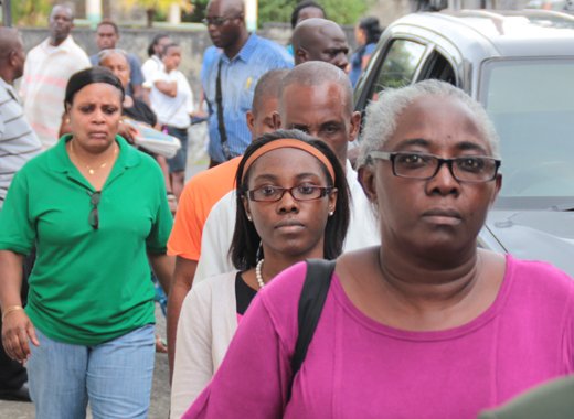 Althia Morgan, her daughter, Krystal, husband, Nigel, and police officer arrive at the Serious Offences Court in Kingstown in April 2016, when they were arraigned. (iWN file photo)