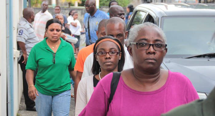 Althia Morgan, her daughter, Krystal, husband, Nigel, and police officer arrive at the Serious Offences Court in Kingstown in April 2016, when they were arraigned. (iWN file photo)