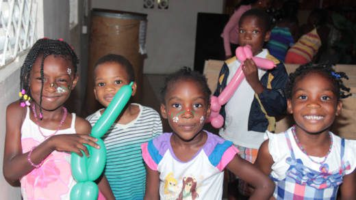 Children show off their face paintings and animal balloons at Saturday's event. (Photo: Rillan Hill Nazarene Church)