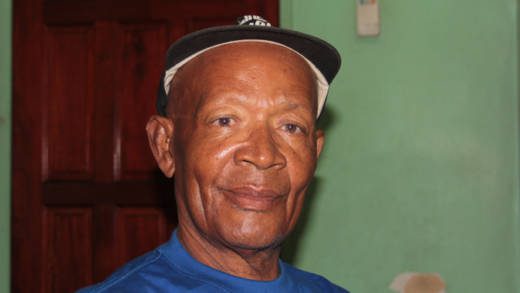 Retiree Hudson Texeira, 73, has been waiting since 2010 for payment for a property the government acquired from him. (IWN photo)