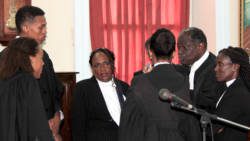 Lawyers for the NDP chat after Thursday's court proceedings. (IWN photo)