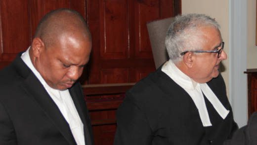 Two of the lawyers for the respondents, Anthony Astaphan, QC, right, and Richard Williams. (IWN photo)