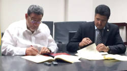 Prime Minister of SVG Ralph Gonsalves, left, and the head of Agreements and International Relations, Department of Air Transport and Airport Affairs, Mohammed Faleh Alhajri of the Qatar Civil Aviation Authority on 12 May 2016.