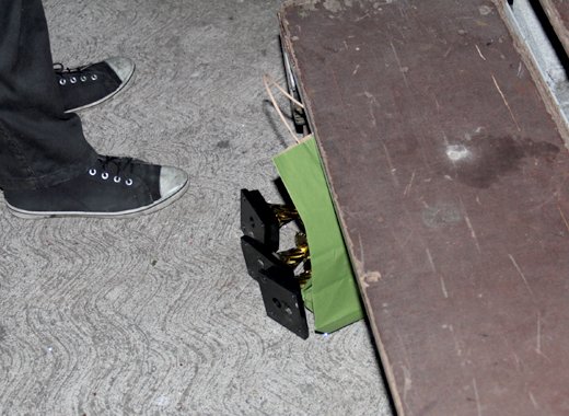 Second Runner-up Keishell Robertson's trophies under a flight of steps backstage. (IWN photo)