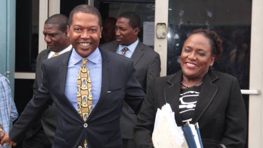 A smiling Ben Exeter and Kay Bacchus-Browne exit the court after the judge's ruling on Monday. (IWN photo)