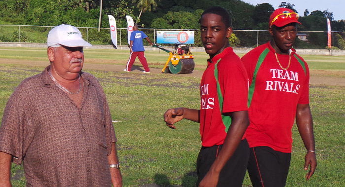 Veira with Anson Latchman and Deightom Butler after their T20 triumph.