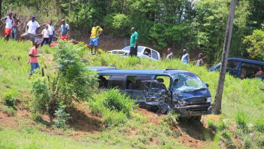 One of the vans at the scene of the accident in Layou. (IWN photo)