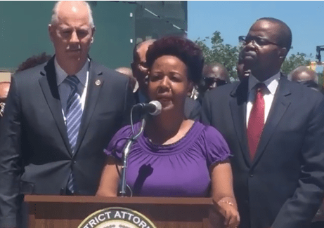 Lucita Nixon, Chanel Petro-Nixon's mother, centre, flanked by NYPD Chief of Detectives, Robert Boyce, left, and Brooklyn District Attorney, Kenneth Thompson, right, at Wednesday's press conference. 