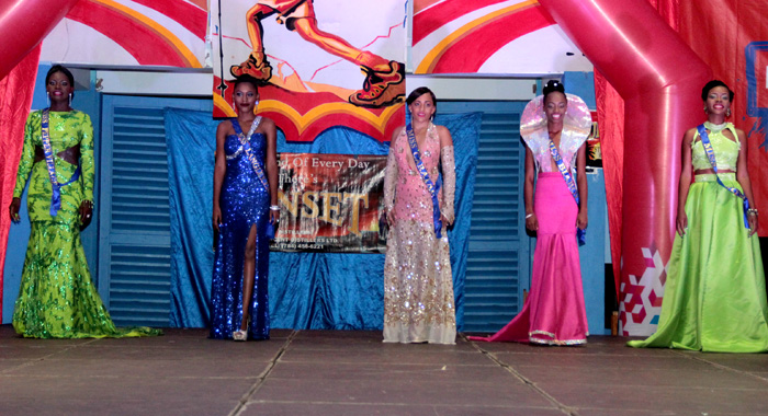 Contestants in eveningwear. Contestants in swimwear. From left: Lorice Nero -- Miss Pepper Village, Kimesia Bowens -- Miss Langley Park, Cristal Pope -- Miss Caratal, Zoneh Seymour -- Miss Biabou, Monifar Cordice -- Miss Kayow. (IWN Photo)