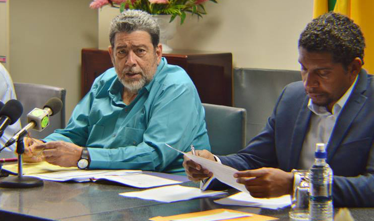 Prime Minister Ralph Gonsalves, left, and Minister of Technology, Camillo Gonsalves at Tuesday's press conference. (Photo: API)