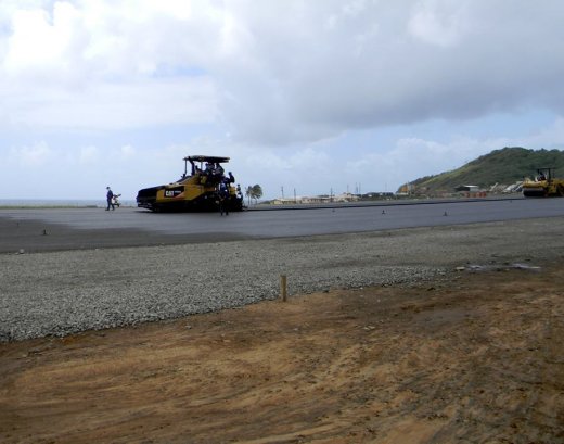 Final pavement on the runway continues, according to this photo uploaded to the Friends of AIA Facebook page on June 30.  