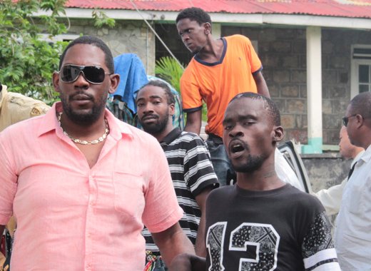 Brydon Joseph and the other murder accused outside the Serious Offences court on July 25, 2016.  They were sentenced on April 28, 2022. (IWN photo)