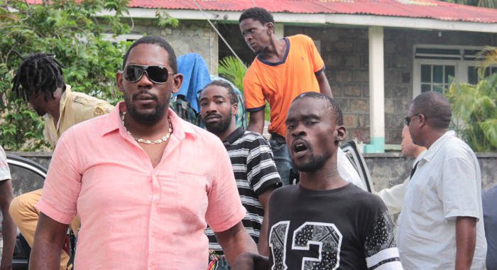 Brydon Joseph and the other murder accused outside the Serious Offences court on July 25, 2016.  They were sentenced on April 28, 2022. (IWN photo)