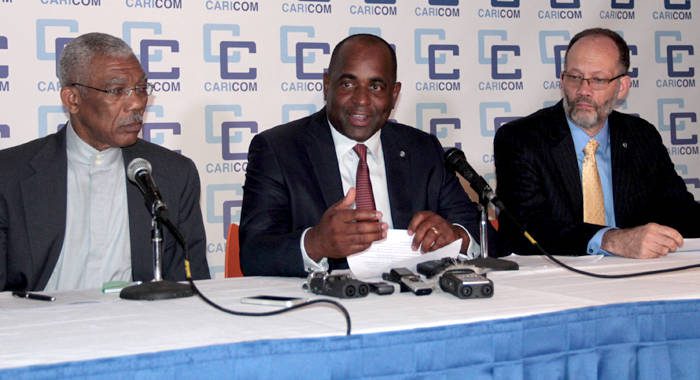 CARICOM Chairman Prime Minister Roosevelt Skerrit (center) flanked by President David Granger (left) and CARICOM Secretary General Irwin La Rocque. (CMC Photo)