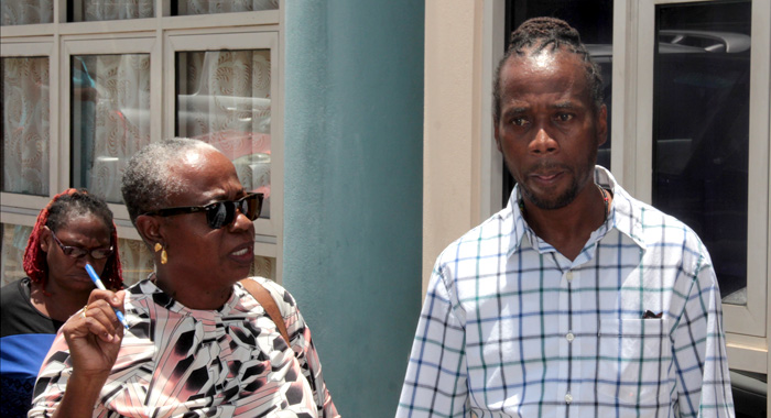 Scrubb speaks with opposition New Democratic Party activist and radio talkshow host, Margaret London after securing bail. (IWN photo)