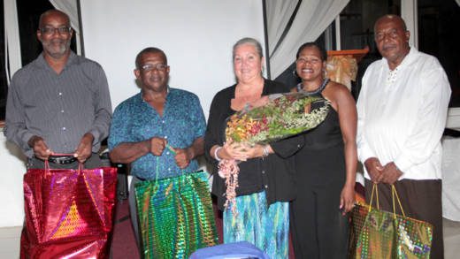 Former teachers, from left, Gordon Michael Davy, Liley Cato, Cassy-Ann Abbott, their former students, Desiree William-Richard, and former teacher Richard David Cumberbatch. (IWN photo)