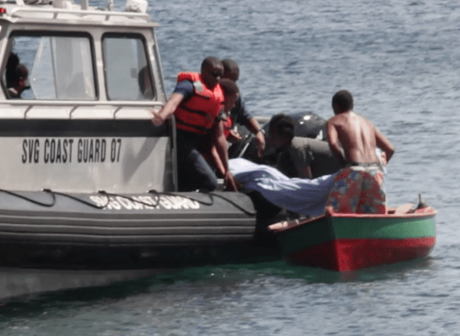  The body of drowned teenager Giovanni Sutherland-Sam is transferred from a Coast Guard vessel to a fishing boat for transfer to land in Clare Valley on Saturday. (IWN photo)
