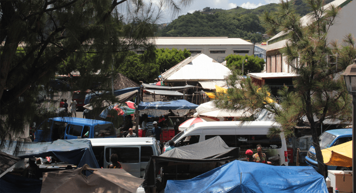 Choked Windward bus terminal and vendor area.