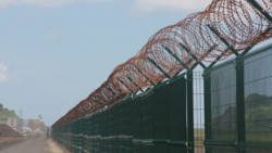 The rusting perimeter fence at Argyle International Airport. 