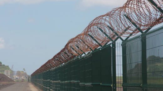 The rusting perimeter fence at Argyle International Airport. 