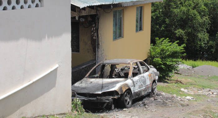 Jafari Robertson's burnt out car outside his home in Prospect. (IWN photo)