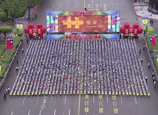 SVG and Taiwan flags line the boulevard outside the presidential office in Taiwan during Taiwan's National Day celebrations on Oct. 10.