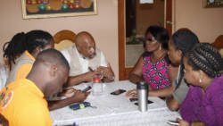 Retired Brigadier General, Earl Aurthur and Mayor Marie Claudette-Regis and their team in discussion about the distribution of CARICOM-sponsored aid for Haitian displaced by Hurricane Matthew. (Photo: CMC/IWN)