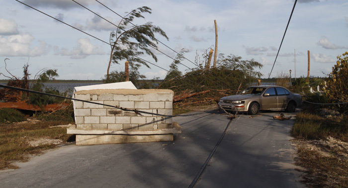 The hurricane dug up this crypt and deposited it in the road in Lowe Sound, North Andros, the Bahamas on Thursday. (Photo: CMC/IWN)