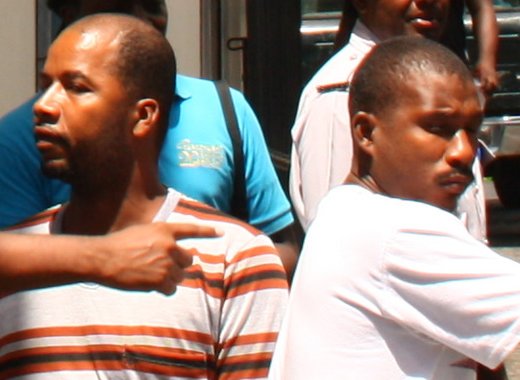 The accused, Ezra Harry, left, and Simeon Francois. 
