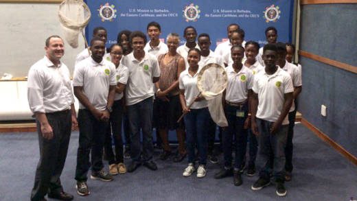 Participants of the citizen scientists workshop pose for a group photo with presenter Dr. Gillian Bowser, and Deputy Public Affairs Officer Jeff Barrus at the conclusion of the session at the SVG Community College.
