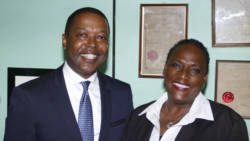 Ben Exeter, right, poses with his lawyer, Kay Bacchus-Baptiste, at her chambers in Kingstown after Monday's court ruling. (IWN photo)