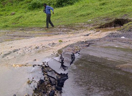 The road just outside the Argyle International Airport collapsed Thursday afternoon. (Photo: Drahcir Notla Enworb/Facebook) 