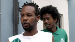 The accused men, Nigel Byron, left, and Yosufu De Riggs arrive in court on Thursday. (IWN photo)