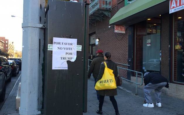 Signs in East Harlem, New York, an area with a high Hispanic population ask voters not to vote for Republican candidate Donald Trump. Credit: Lyndal Rowlands/IPS.