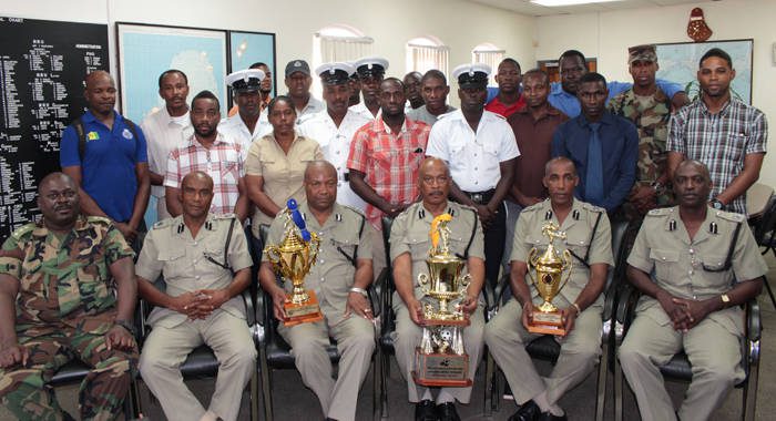 Acting Commissioner of Police, Renold Hadaway, third from right, flanked by Assistant Superintendent of Police Benzil Samuel, left; Assistant Commissioner of Police Frankie Joseph; Deputy Commissioner of Police Colin John; and Assistant Commissioners of Police Christopher Benjamin and Carlos Sampson.