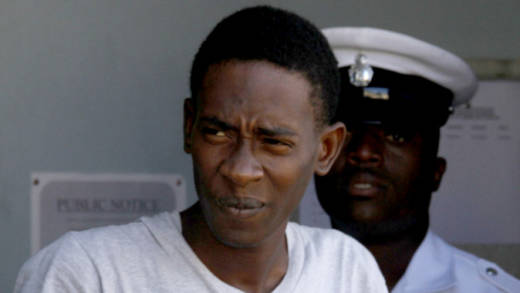 Lara Carter one of the accused men walked amidst the confusion over the charges. (iWN file photo)