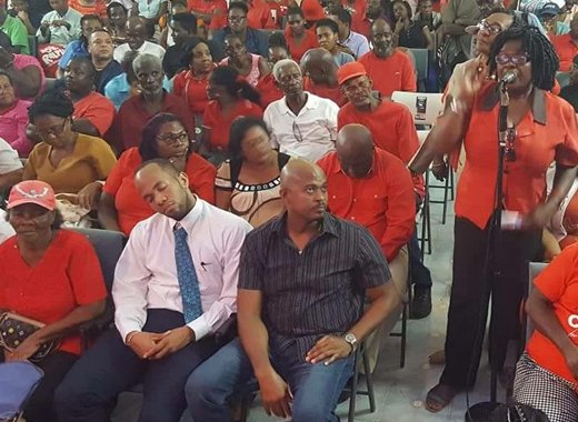 Minister of Health, Sen. Luke Browne (wearing necktie) at a Unity Labour Party event on Monday, hours after Prime Minister Ralph Gonsalves said no nurse was at a clinic when a grieving mother went there. (Photo: Facebook)  