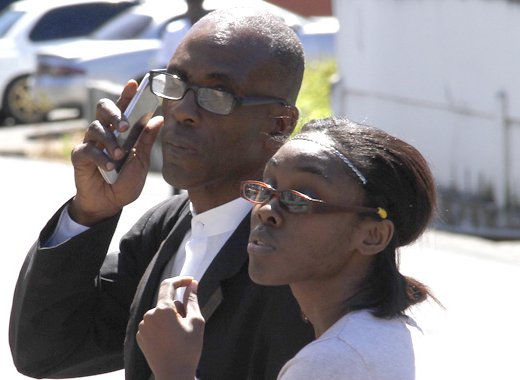 Pastor Nigel Morgan and his daughter, Krystal, after a court appearance in January 2017. (iWN photo)