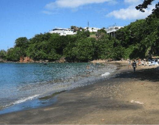 The mixed sand beach (coral and volcanic rock) at Villa, SVI.
