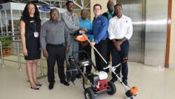 Natasha Devonish, AIA Finance & Admin Manager, Andre Sutherland, OSV Signs & Graphics Manager, Bruce Barrow, OSV Representative, Hadley Bourne , AIA CEO, Stevie Sutherland, OSV Marketing Manager.