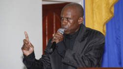 Bishop Julius Louis delivers the sermon at the funeral on Sunday. (iWN photo)
